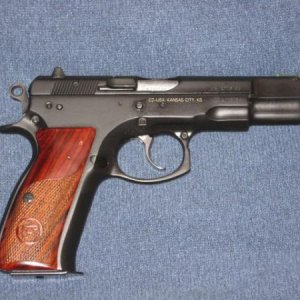 CZ 75BD 003  This was some guys' safe queen...he was a Glock man and could not grow to love her. His loss..my gain. SO HAPPY!