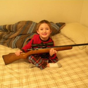 Marlin 25n, This is the first gun I ever owned.  My mom bought it for me for my 14th birthday.  This is my 4yr old son and this will one day be his fi